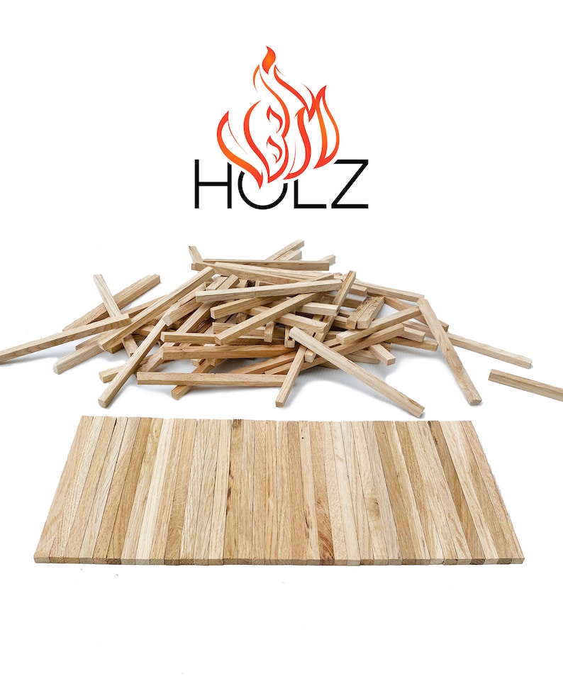 May include: A pile of natural wood sticks, arranged in a rectangular shape, with a logo that says "HOLZ" above the pile. The logo features a stylized orange flame.