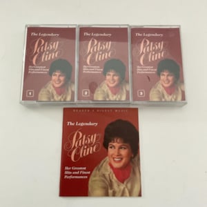 May include: Three cassette tapes and a booklet featuring Patsy Cline. The tapes and booklet have a red background with the text "The Legendary Patsy Cline" and a photo of Patsy Cline. The tapes are numbered 1, 2, and 3.