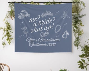 May include: A blue banner with white illustrations of a carriage, crown, ring, and other bridal-themed icons. Text reads "me? a bride? shut up! Mia's Bachelorette Scottsdale 2025."
