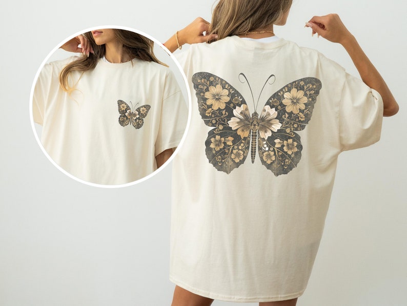 Vintage-style butterfly Comfort Colors t-shirt featuring a small floral butterfly graphic on the front and a large, detailed botanical butterfly on the back. Soft oversized aesthetic, perfect for cottagecore outfits, nature lovers, and retro graphic tee fans.