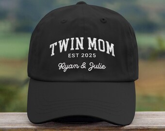 May include: Black baseball cap with white embroidered text that reads "Twin Mom Est 2025 Ryan & Julie".