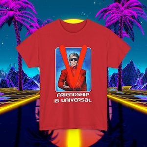 May include: Red t-shirt with a graphic of a man in a red suit with a V on his chest. The text "Friendship is Universal" is printed below the graphic.