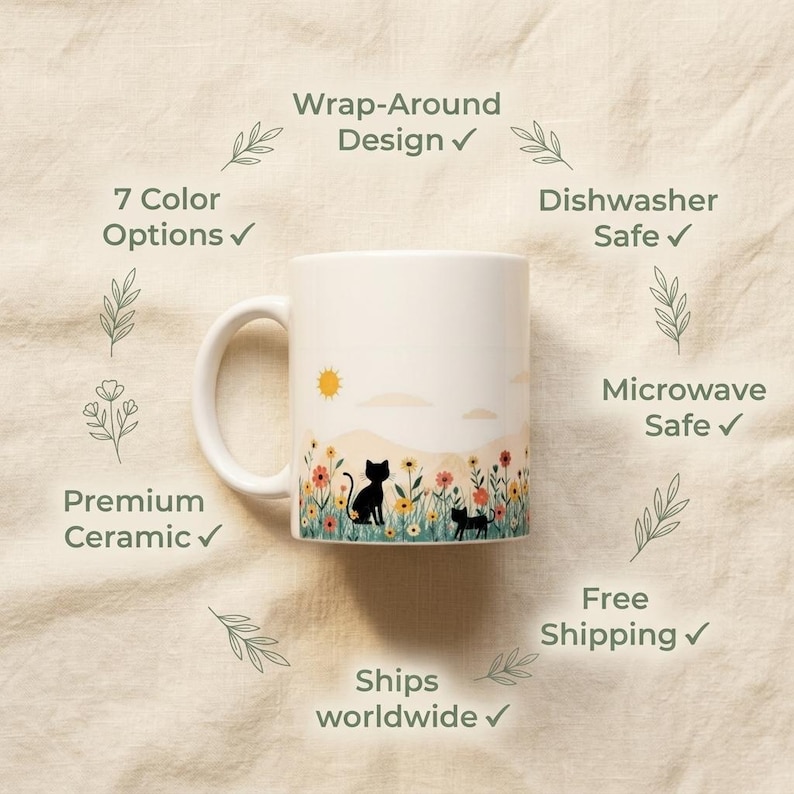 May include: A white ceramic mug featuring a wrap-around design of two black cats sitting in a field of colorful wildflowers under a yellow sun. The text on the image includes Wrap-Around Design, 7 Color Options, Dishwasher Safe, Microwave Safe, Premium Ceramic, Free Shipping, and Ships worldwide.
