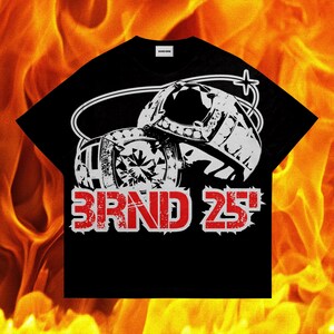May include: Black t-shirt with a graphic print of two large diamond rings and the text "3RND 25" in red.