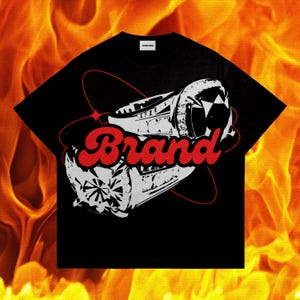 May include: Black t-shirt with a white graphic of a ring with a large diamond and the word "Brand" in red letters.