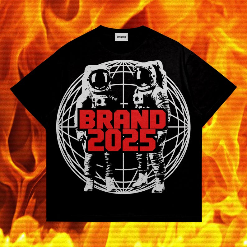 May include: Black t-shirt with a graphic of two astronauts standing in front of a globe with the text "BRAND 2025" in red.