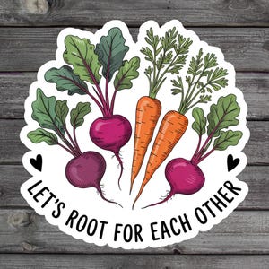 May include: A sticker featuring a colorful illustration of beets and carrots. The beets are purple with green leaves, and the carrots are orange. The text "Let's Root For Each Other" is written in a circular pattern around the vegetables.