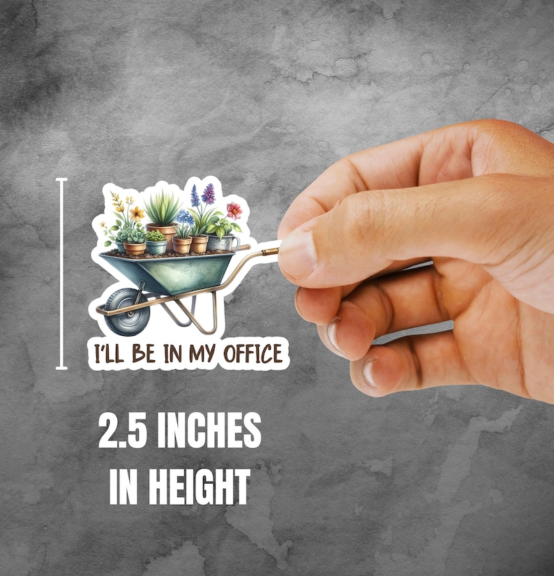 May include: A sticker featuring a watercolor illustration of a wheelbarrow filled with potted plants. The sticker is 2.5 inches in height and has the text "I'LL BE IN MY OFFICE". The wheelbarrow is teal with a silver handle.
