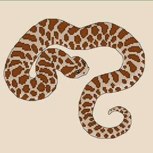 May include: Cross stitch pattern of a Western Hognose Snake, a brown and white snake with a curled tail, on an ivory background. Pattern size: 140 x 110. Fabric count: 10. Finished size: 14.0 x 11.0 inches. Total stitches: 7,156. Total skeins: 8. Fabric color: Ivory (264).