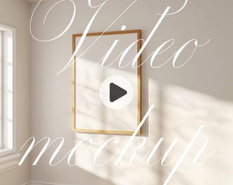 May include: A white wall with a wooden frame around a blank video screen. The screen has a play button icon in the center. The text "Video Mockup" is written in cursive on the wall.