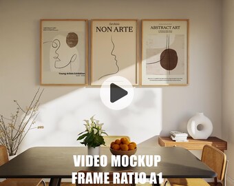 Puede incluir: Una mesa de comedor negra con una superposición de maqueta de video, que presenta el texto "VIDEO MOCKUP FRAME RATIO - A1". La mesa está puesta con un jarrón de flores blancas y un tazón de naranjas. Tres impresiones de arte abstracto enmarcadas cuelgan en la pared detrás de la mesa.