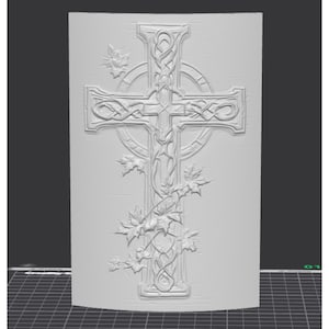 May include: A detailed, off-white Celtic cross design with intricate knotwork and leaf accents. The cross is centered on a rectangular background, with a circular element at the intersection of the arms. The design is a relief carving.