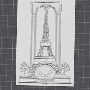 May include: A white relief sculpture featuring the Eiffel Tower, framed by an arch and decorative elements. The sculpture includes trees and a landscape scene at the base, showcasing intricate details.