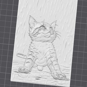 May include: A grayscale relief carving of a kitten looking upwards in the rain. The kitten has detailed fur markings and is sitting with its front paws extended. The background shows rain falling.