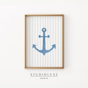 May include: A blue anchor graphic on a white and light blue striped background. The anchor is in a gold frame.