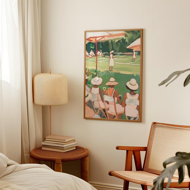 May include: A framed painting of women in hats sitting on chairs and watching a tennis match. The painting is in a gold frame and has a green background.