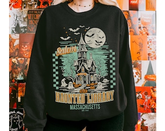 Haunted Library Sweatshirt for Book Lover Salem Halloween Librarian Graphic Tee Bookish Spooky Crewneck Reading Ghost T-Shirt Fall Hoodie