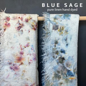 May include: Two hand-dyed linen textiles, one with a white base and colorful floral-like patterns, the other in blue and green hues. The text "BLUE SAGE pure linen hand dyed" is at the top.