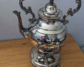 WM Rogers silver plated tilting teapot