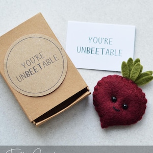 May include: A handmade wooden serving tray with a natural finish. The rectangular tray has raised edges and integrated handles. The wood grain is visible, highlighting the craftsmanship. Dimensions are approx. 40 cm long and 25 cm wide.