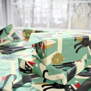 Holiday Present Wrapping Paper Cat Christmas Design Festive Black Cat Pattern Santa Hat Cats Gift Packaging Material Winter Holiday Theme Whimsical Cat Lover Present Wrap Unique Christmas Decoration Perfect Gift Giving Material Special Cat