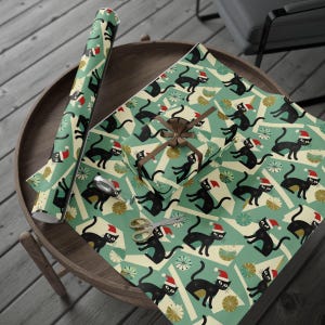 Festive Holiday Gift Wrap Cat Christmas Paper Black Cat Santa Hat Pattern Whimsical Present Packaging Material Cat Lover Christmas Gift Wrap Unique Holiday Design Winter Season Wrapping Paper Festive Cat Pattern Special Present Packaging