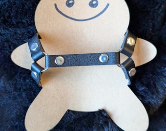 Faux-leather harness for plush dolls