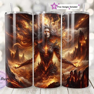 May include: A stainless steel tumbler with a fantasy art design. The artwork features a fiery woman with long hair and outstretched arms, set against a backdrop of a volcanic landscape. The tumbler includes a straw and the text "6 Free Designs Included".
