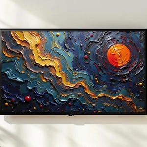 May include: Abstract art piece displayed on a black framed rectangular screen. The artwork features a textured, swirling design in shades of blue, orange, and yellow, with red and yellow spherical accents. The central focus is a bright orange circular shape.