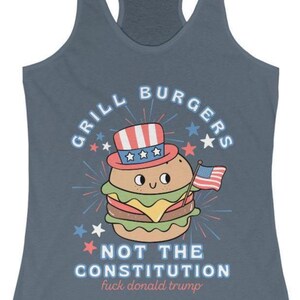 May include: A blue vest top featuring a cartoon burger in a patriotic hat, holding a small American flag. Text says "GRILL BURGERS NOT THE CONSTITUTION fuck donald trump."