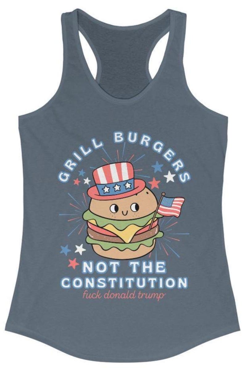 May include: A blue vest top featuring a cartoon burger in a patriotic hat, holding a small American flag. Text says "GRILL BURGERS NOT THE CONSTITUTION fuck donald trump."