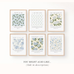 May include: Six printable wall art prints with floral patterns and bible verses. The prints feature a white background with blue floral patterns and black text. The verses are "Abide in Me", "I Am the Vine", "The Lord Bless You", "Count It All Joy", "Steadfast Love", and "The God of Hope".