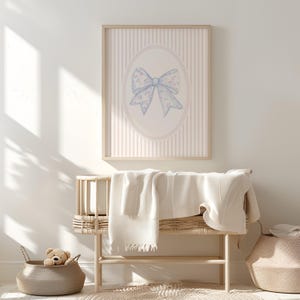 This elegant watercolor bow nursery print brings classic coquette nursery decor to life with soft florals and a vintage grandmillennial aesthetic. Ideal for a pink nursery gallery wall, this printable bow wall art adds timeless charm to a baby girl nursery, toddler room, or feminine space. Download instantly to style beautiful nursery wall art prints or bow wall decor for your girl’s room.