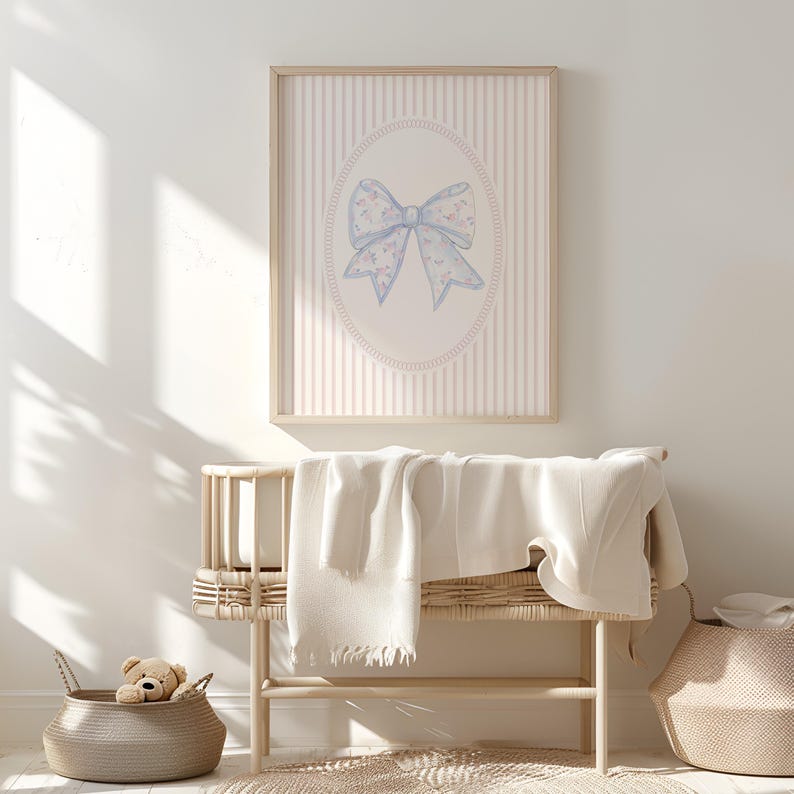 This elegant watercolor bow nursery print brings classic coquette nursery decor to life with soft florals and a vintage grandmillennial aesthetic. Ideal for a pink nursery gallery wall, this printable bow wall art adds timeless charm to a baby girl nursery, toddler room, or feminine space. Download instantly to style beautiful nursery wall art prints or bow wall decor for your girl’s room.