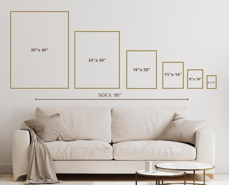 May include: A visual guide to help you choose the right size artwork for your 90-inch sofa. The image shows six different sizes of framed artwork, ranging from 30 inches by 40 inches to 5 inches by 7 inches, with the sofa in the foreground.