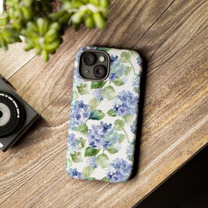 iphone case hydrangea / hydrangea iphone case / phonecase / floral phone case / phonecases / hydrangea phone case iphone 16 pro / hydrengea phone case 13 mini / hydrangea matte iphone 14 / trendy phone case / hydrengea phone case / aesthetic hydrangea phone cases iphone 16 / iphone 16 case hydrangea / grandmillenial phone case / hydrangea tough iphone 16 case / pretty blue floral phone case / iphone 15 pro max grandmillenial case / trendy iphone / cell phone cases /