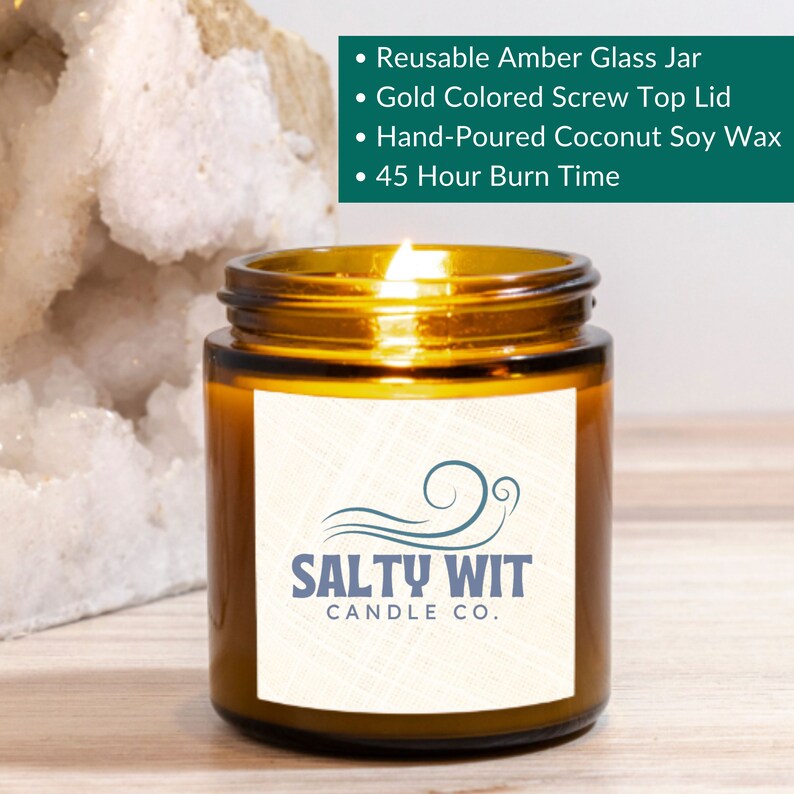 May include: A brown glass candle jar with a gold lid and a white label. The label has a blue wave design and the text "SALTY WIT CANDLE CO.".