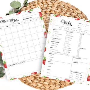 Peut inclure: Deux pages imprimables avec un motif de fraises. La première page est un planificateur mensuel avec une section pour le poids de départ et une grille pour chaque jour de la semaine. La deuxième page est un planificateur quotidien avec des sections pour la phase, la durée du jeûne, comment je me sens, à faire, liste d'épicerie, apport en eau, entraînement et lectures de glycémie.