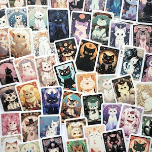 May include: A set of 50 colorful stickers featuring cats in various poses and designs. The stickers are inspired by tarot cards and feature a variety of colors, including black, white, pink, blue, and green. The stickers are perfect for adding a touch of whimsy to your planner, laptop, or water bottle.