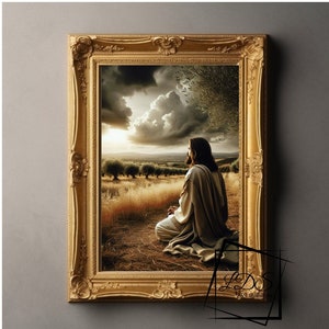 May include: A painting of Jesus in a field, kneeling and praying with his hands clasped. The sky is cloudy and the sun is setting in the distance. The painting is framed in a gold frame.