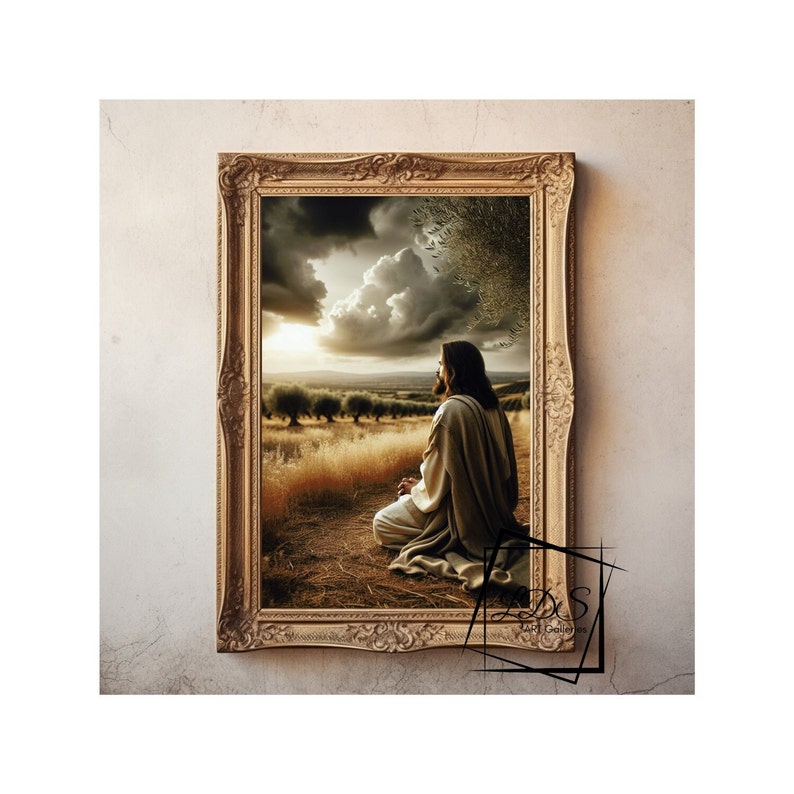 May include: A framed painting depicting a man in a long robe kneeling in a field with his head bowed in prayer. The background features a dramatic sky with clouds and a distant sunset.