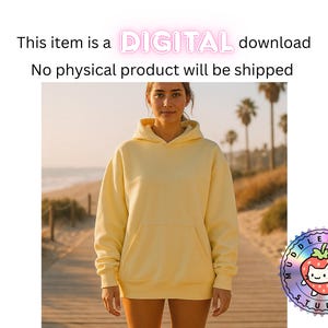 May include: A person wearing a pale yellow hoodie with a front pocket, standing on a wooden boardwalk. The text "DIGITAL download" is above the person. The image is set against a beach backdrop with palm trees.