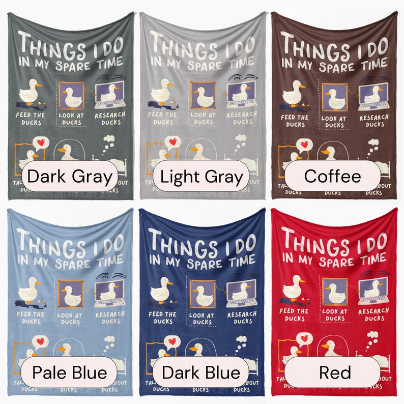 May include: Six different colored fleece blankets with the text "Things I do in my spare time" and a cartoon image of ducks. The blankets are in the colors dark gray, light gray, coffee, pale blue, dark blue, and red.