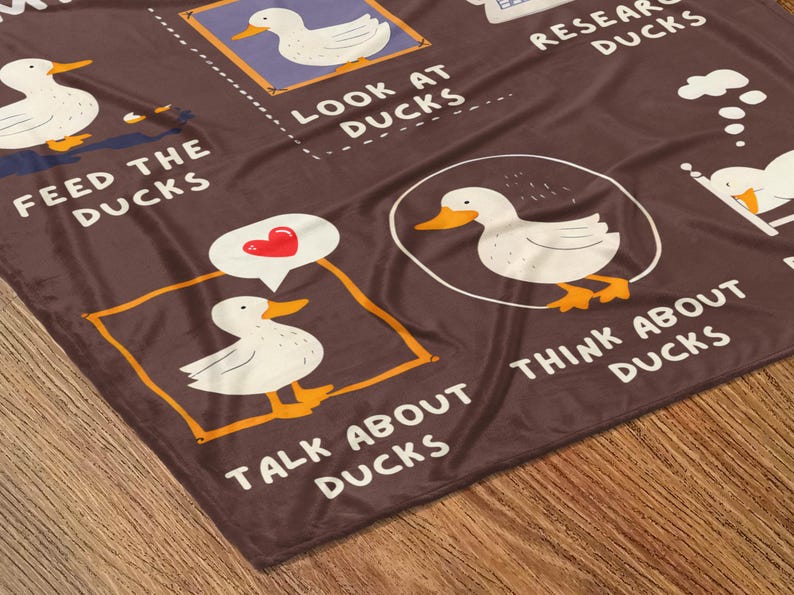 Funny Ducks Blanket folded and presented as a Duck Lover Gift for Him or Her, emphasizing its appeal as a Hilarious Duck Gift and duck gag gift. Perfect as a Duck Mom Gift, Duck Owner Gift, or ducks gift for her, this Duck fleece blanket suits Duck Enthusiast celebrations, baby showers, farmhouse-themed gifts, and thoughtful personalized keepsake moments.
