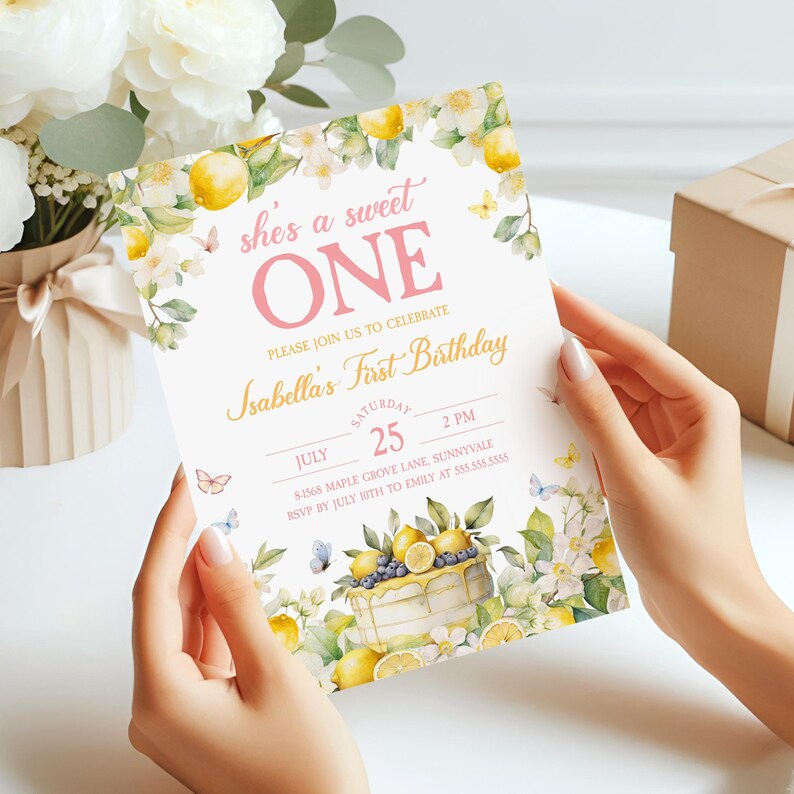 May include: A lemon-themed first birthday party invitation with a watercolor illustration of lemons, flowers, and butterflies. The invitation says "She's a sweet one" and includes the details of the party, including the date, time, and location.