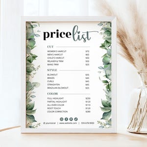 May include: A framed price list for a hair salon with a watercolour floral design. The price list includes services such as haircuts, blowouts, braids, curls, straightening, Brazilian blowouts, full highlights, partial highlights, all over colour, root touch, and colour correction.
