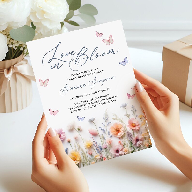 May include: A floral bridal shower invitation with butterflies and the text "Love in Bloom" and "Bianca Simpson". The invitation is for a bridal shower on July 25th at 2:00 PM at the Garden Rose Tea House.