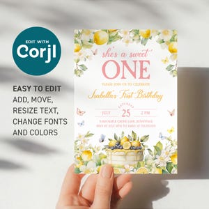 May include: A lemon-themed first birthday invitation with a watercolor illustration of a cake with lemons, blueberries, and flowers. The text reads "She's a sweet one" and "Isabella's First Birthday". The date and time of the party are July 25th at 2 PM. The address and RSVP information are also included.