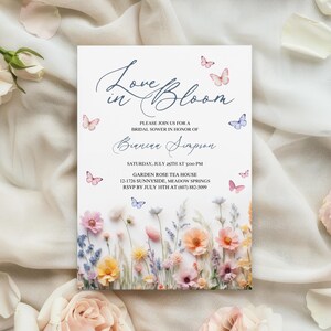 May include: A bridal shower invitation with a floral design and butterflies. The invitation reads "Love in Bloom" and includes the name "Bianca Simpson", the date "Saturday, July 25th at 3:00 PM", the location "Garden Rose Tea House", and the address "12-1726 Sunnyside, Meadow Springs". The RSVP information is "RSVP by July 10th at (607) 882-5099".
