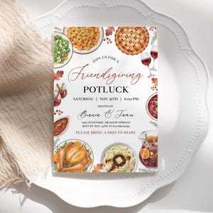 May include: A Friendsgiving potluck invitation on a white plate. The invitation features watercolor illustrations of various dishes and fall leaves. Text includes "Join us for a Friendsgiving Potluck" and event details.